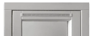 A white kitchen cabinet equipped with trickle vents for proper air circulation.